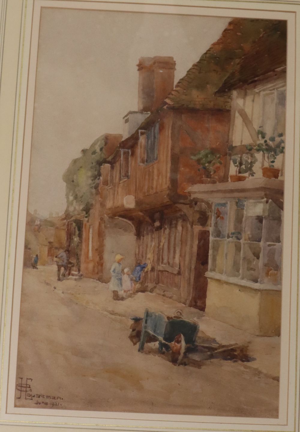 Edith Giffard Houseman (1875-), watercolour, Street scene with old cottage, signed and dated 1921, 33 x 21cm